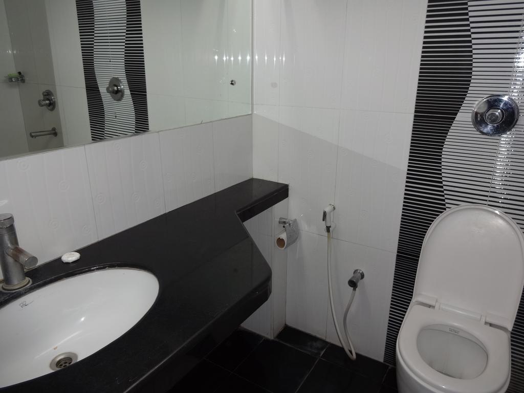 La Hospin Hotel Rājahmundry Zimmer foto